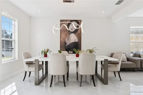 a view of a dining room with furniture