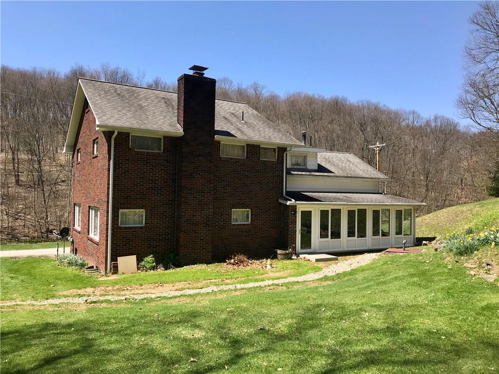 1180 Kunkle Road Creekside, PA 15732 - Photo 3 of 25 Back view, heated (ventless gas wall heater) enclosed porch