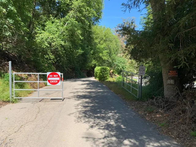 a sign that is on the side of the road