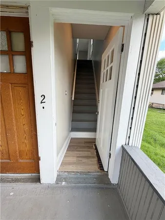 a view of a stairs and an entryway