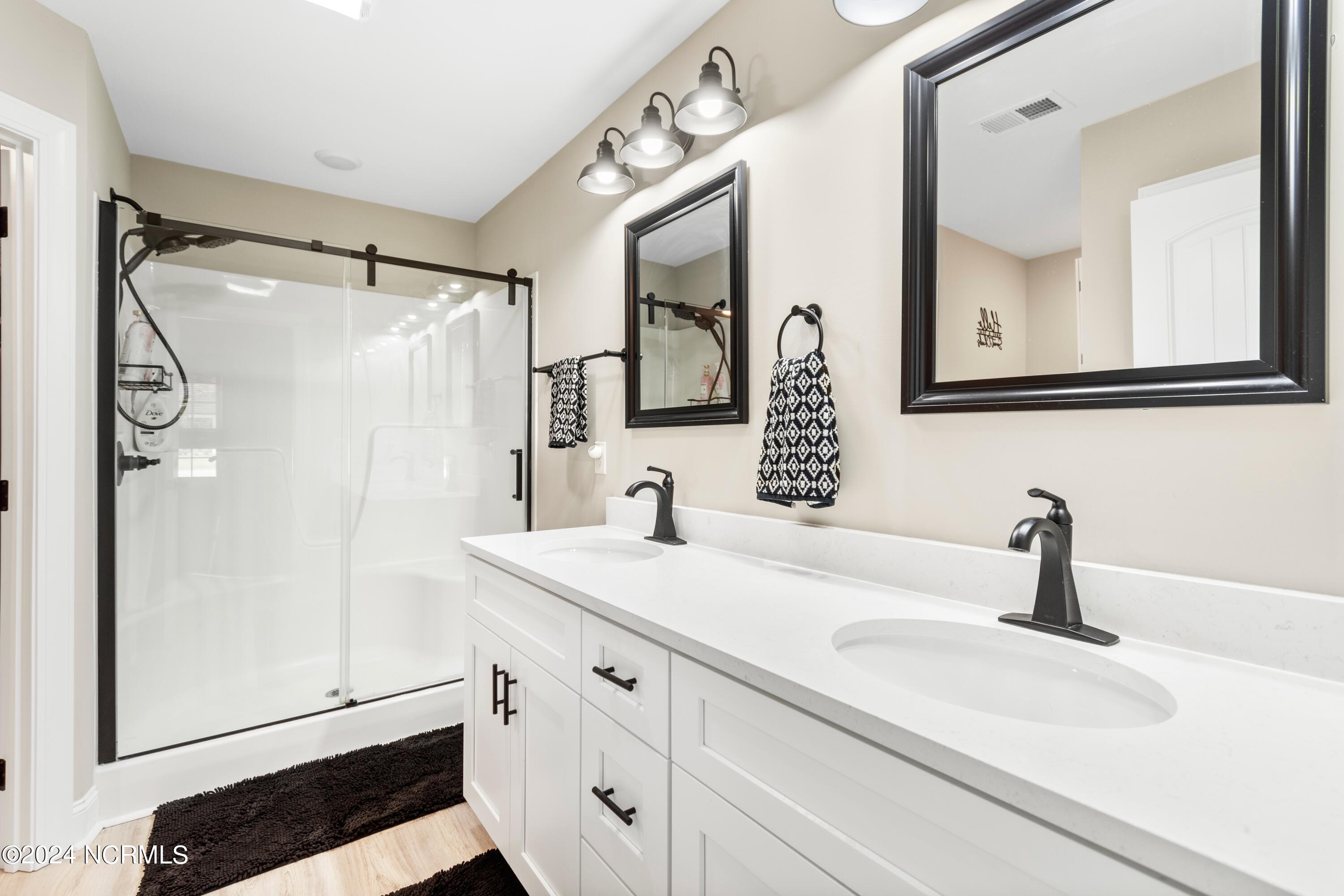 185 Boundary Loop Road Northwest Calabash, NC 28467 - Photo 22 of 56 Master bathroom