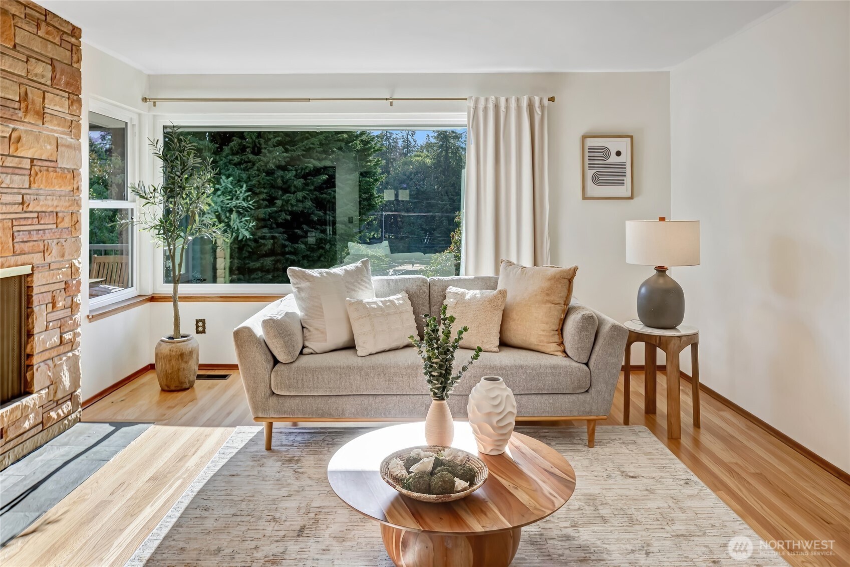 7571 45th Avenue Southwest Seattle, WA 98136 - Photo 3 of 40 a living room with furniture and a large window