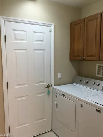 a room with storage and utility