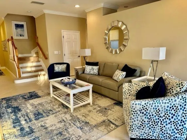 a bed room with a bed and a couch