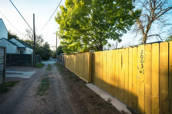 a view of a house with a small yard