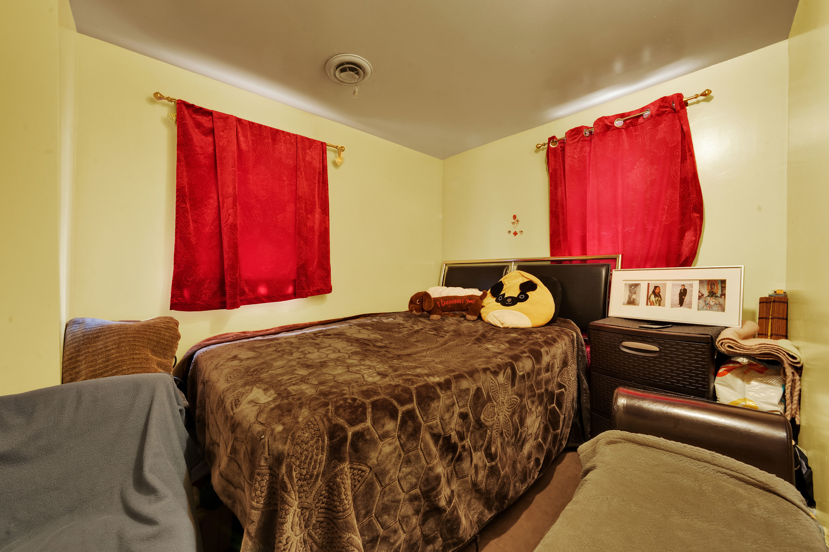 1404 West Fuller Street Chicago, IL 60608 - Photo 15 of 17 a bed sitting in a bedroom next to a window