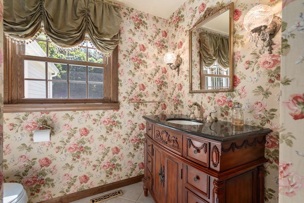 2035 Parker Street Springfield, MA 01128 - Photo 19 of 42 a bathroom with a bathtub and a shower