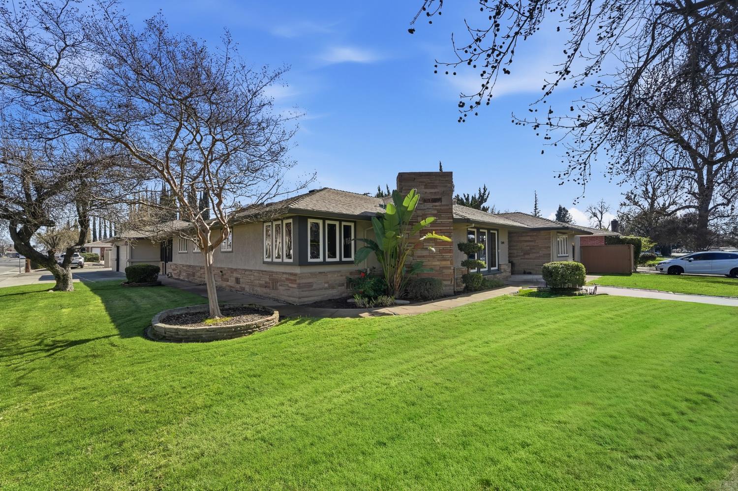 1344 Magnolia Avenue Modesto, CA 95350 - Photo 2 of 71 a front view of a house with a yard