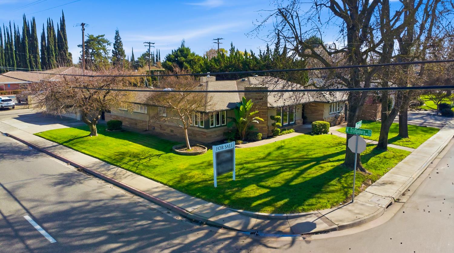 1344 Magnolia Avenue Modesto, CA 95350 - Photo 60 of 71 a view of a swimming pool with a patio and couches chairs