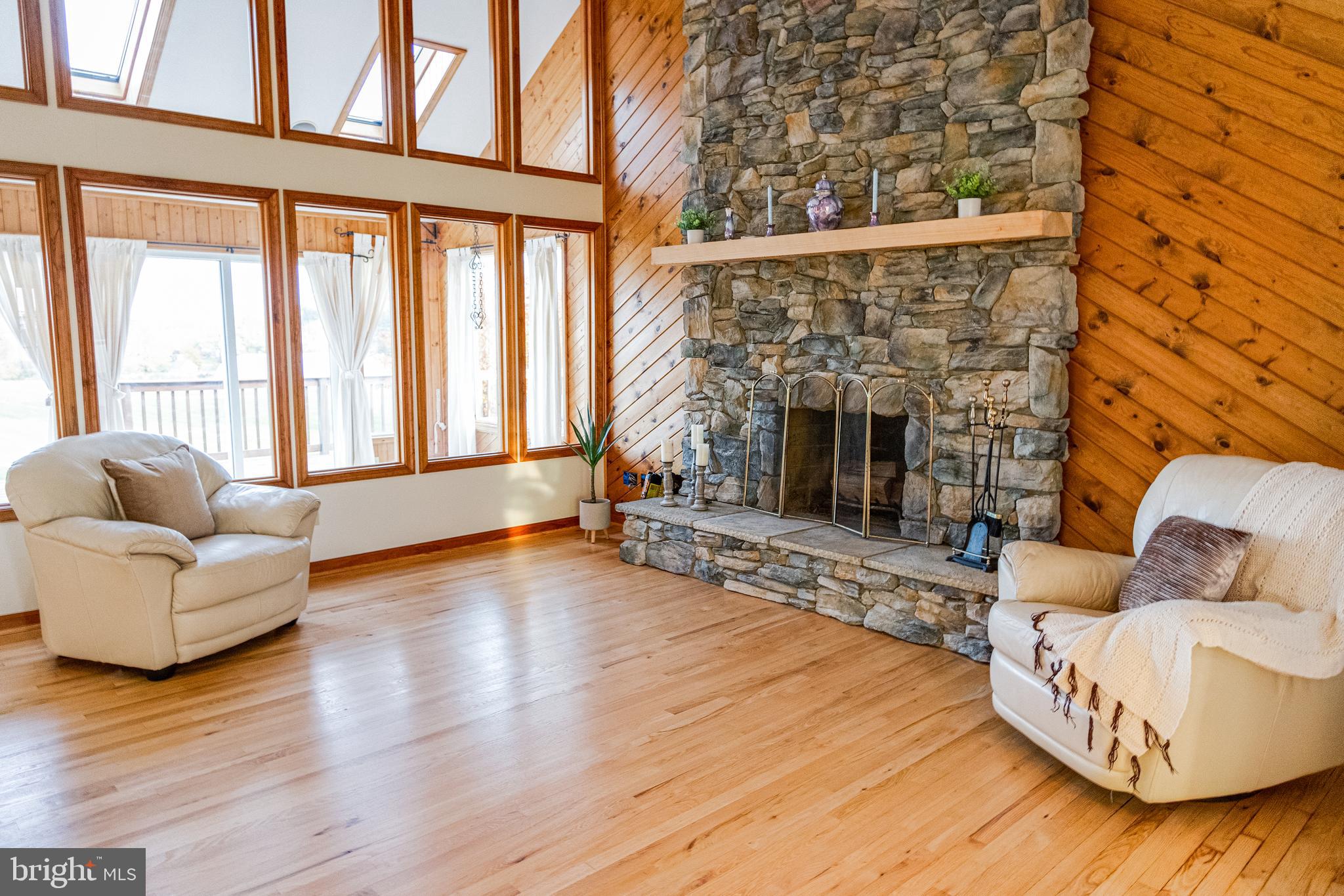 Floor to ceiling wood fireplace