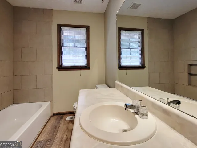 an empty room with windows