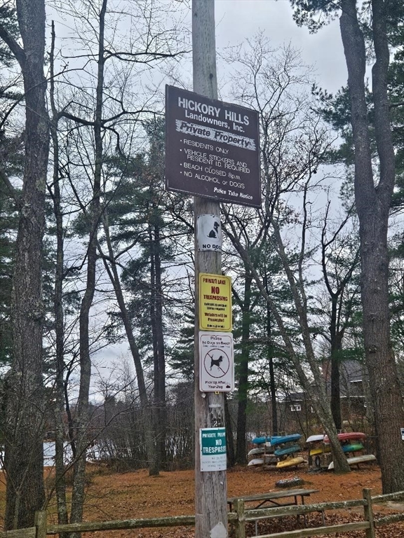 55 Beachview Road Lunenburg, MA 01462 - Photo 3 of 3 a sign that is on the side of a road