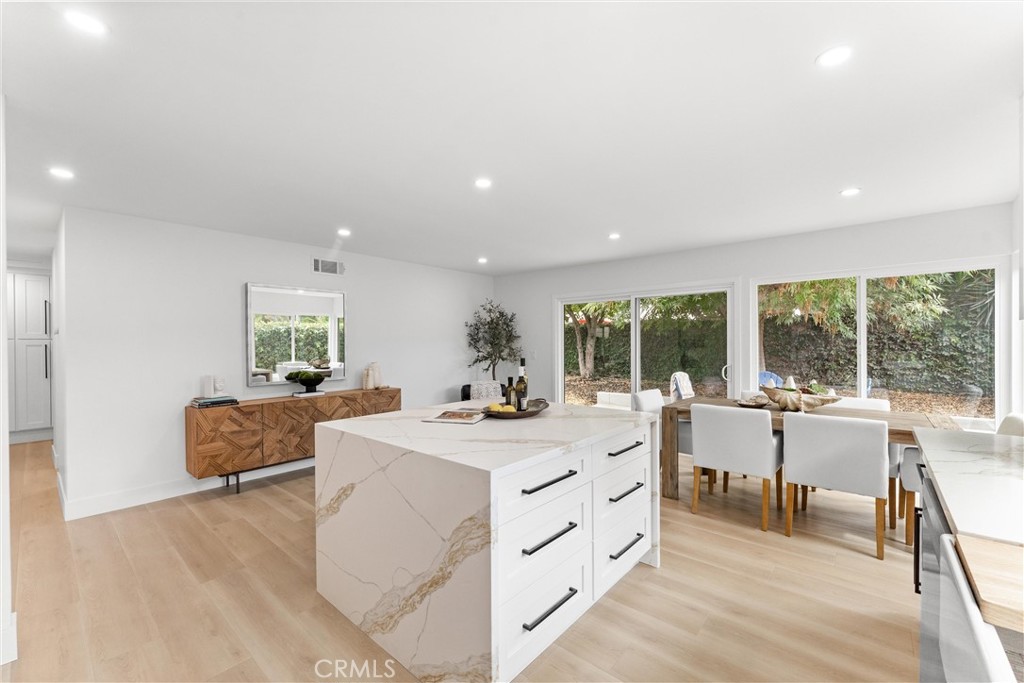 3621 Myrtle Street Irvine, CA 92606 - Photo 16 of 40 a view of living room with granite countertop furniture and a large window