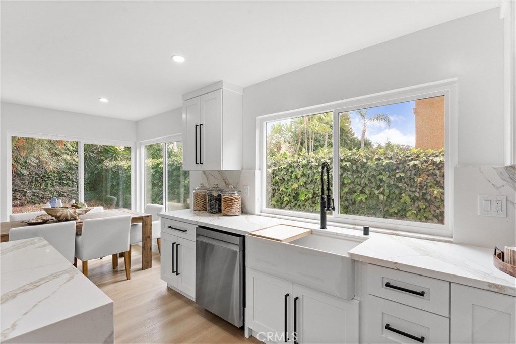3621 Myrtle Street Irvine, CA 92606 - Photo 17 of 40 a kitchen with a sink and large window