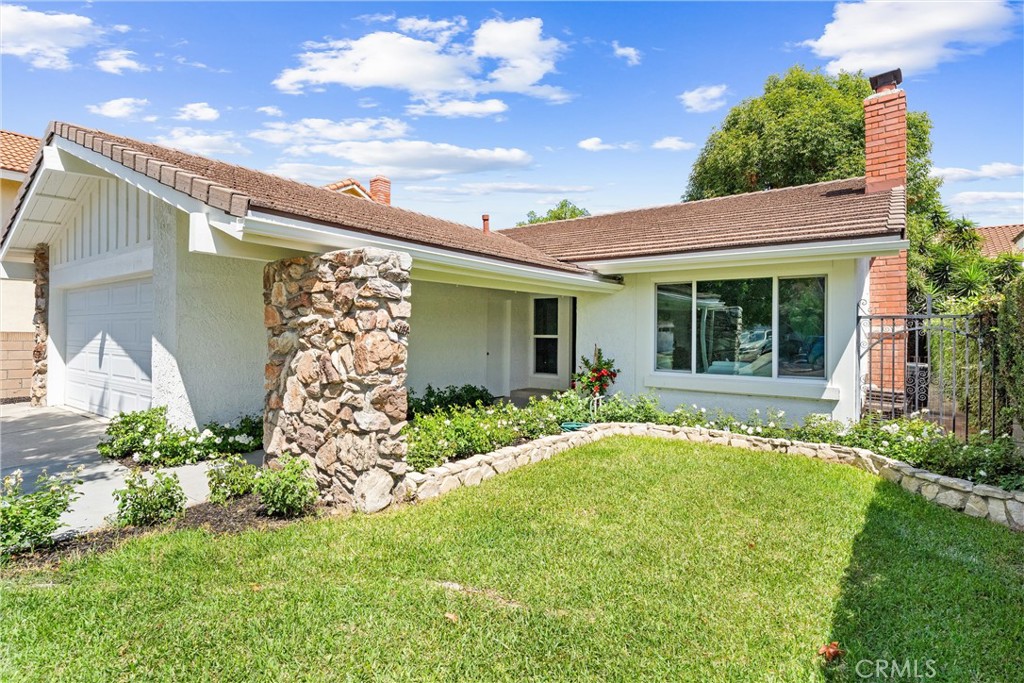 3621 Myrtle Street Irvine, CA 92606 - Photo 27 of 40 a front view of a house with garden