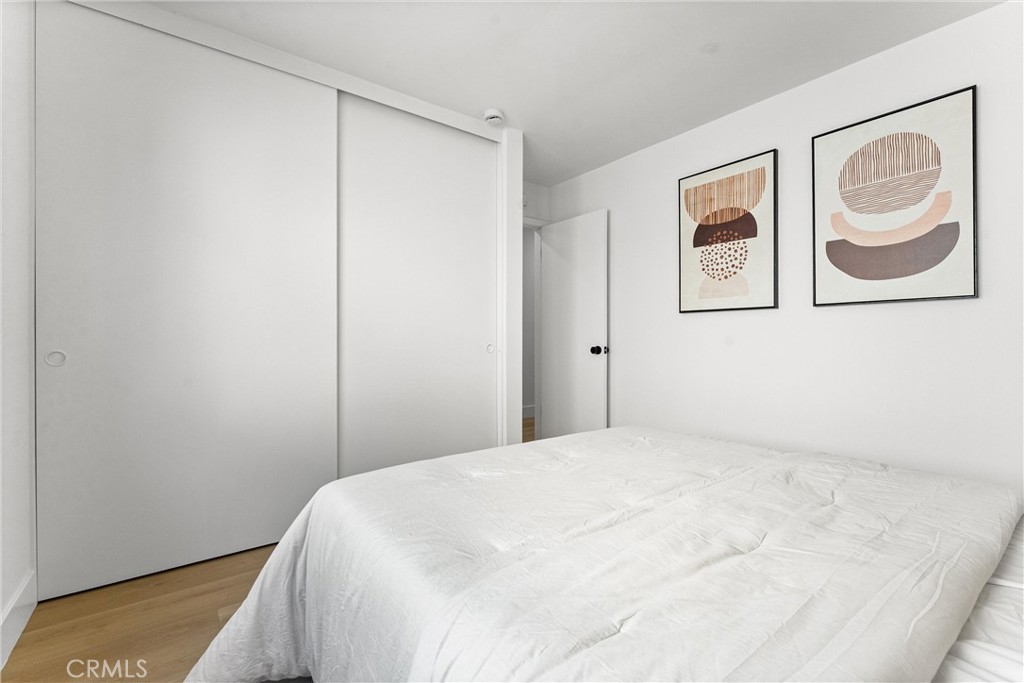 3621 Myrtle Street Irvine, CA 92606 - Photo 32 of 40 a bedroom with a bed and painting on the wall