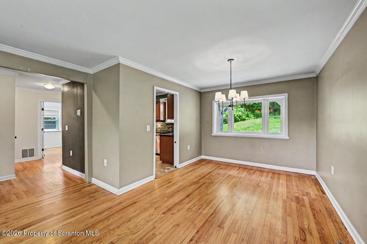 457 Craig Road Dalton, PA 18414 - Photo 24 of 114 wooden floor in an empty room with a window
