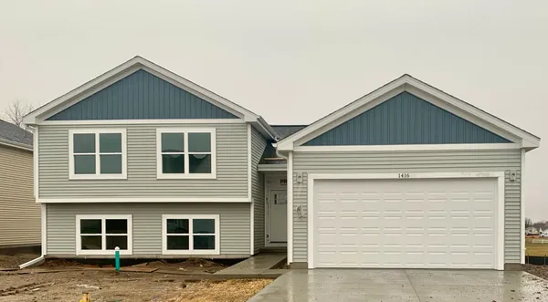 a view of a house with garage