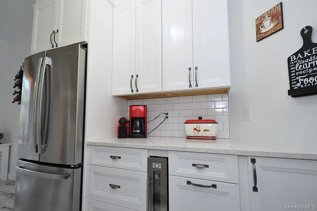 a kitchen with a stove and a microwave