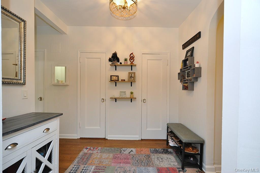 143 Garth Road, Unit 3L Scarsdale, NY 10583 - Photo 28 of 50 a view of room with a window and wooden floor
