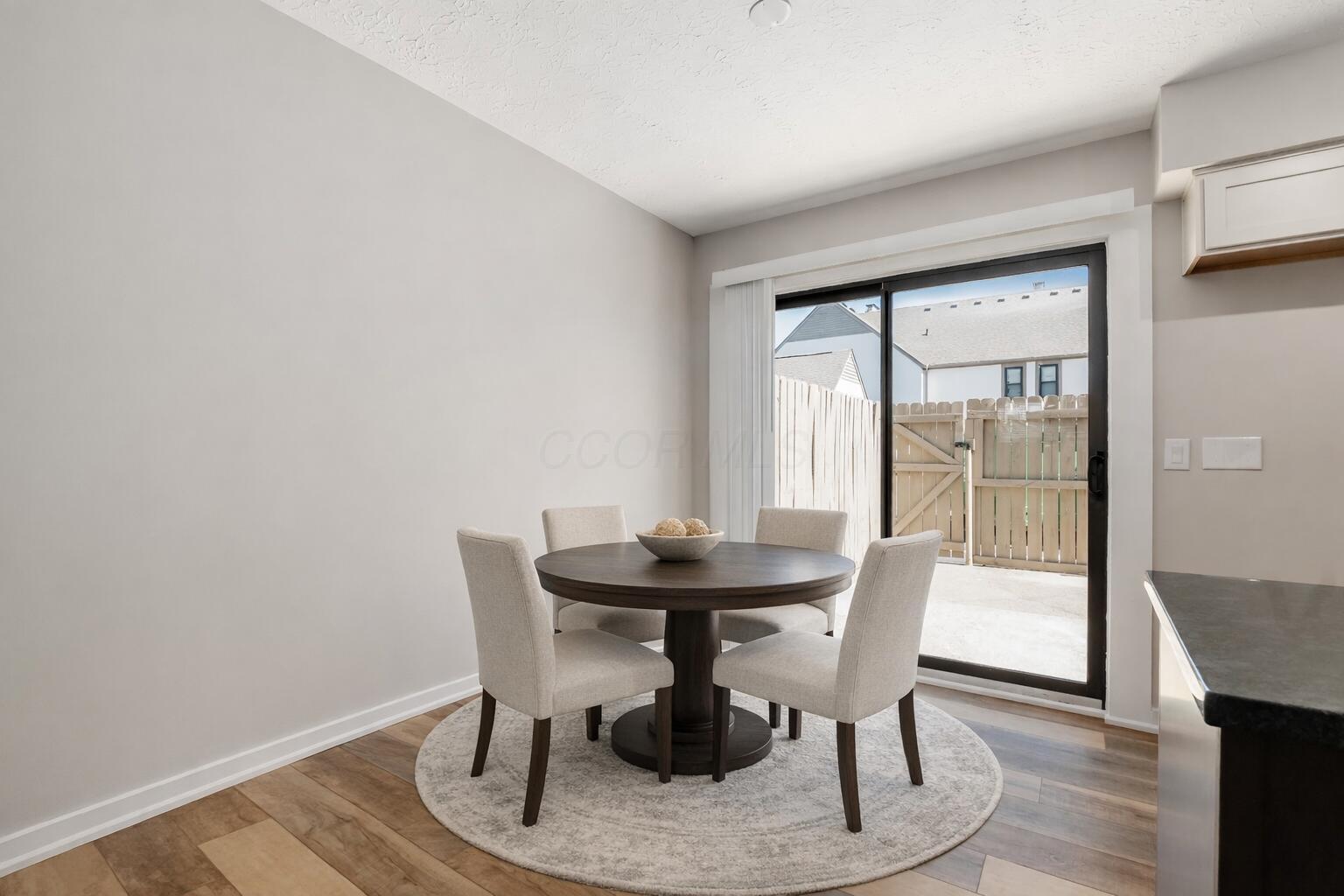 410 Edinburgh Road, Unit 410 Dublin, OH 43017 - Photo 7 of 22 Virtually Staged-Modern dining area