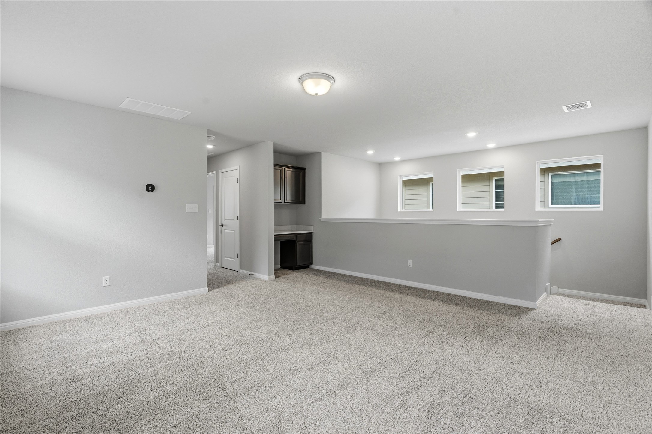 145 Beach Mountain Road Dripping Springs, TX 78620 - Photo 25 of 40 This space can easily adapt to your lifestyle, whether you envision a media room, play space, home office, or cozy lounge.