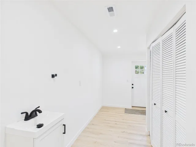 a view of a room with a sink