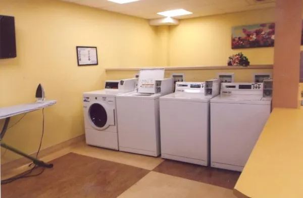 a view of a kitchen with washer and dryer