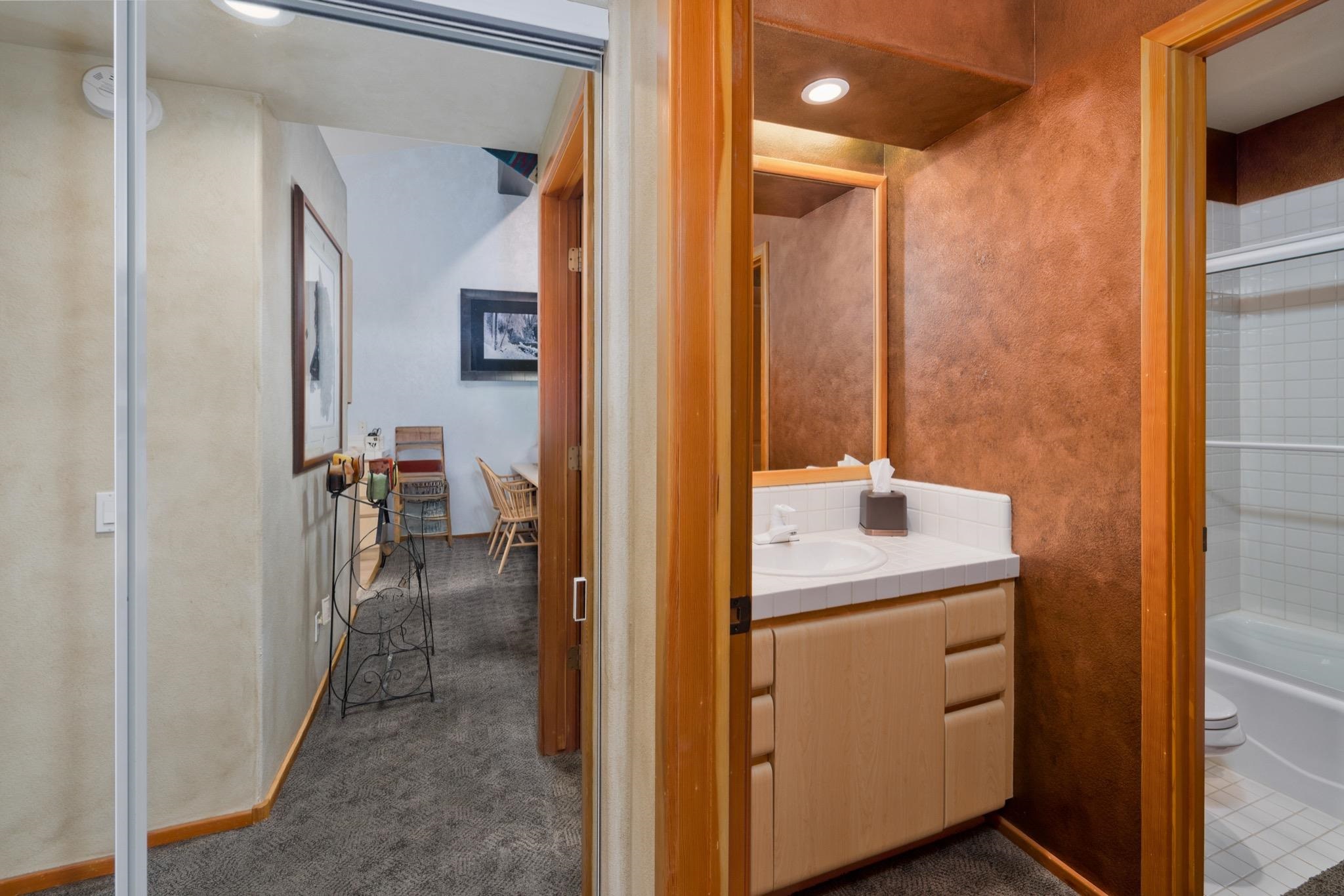 930 Links Way, Unit 930 Mammoth Lakes, CA 93546 - Photo 20 of 40 a bathroom with a sink and mirror