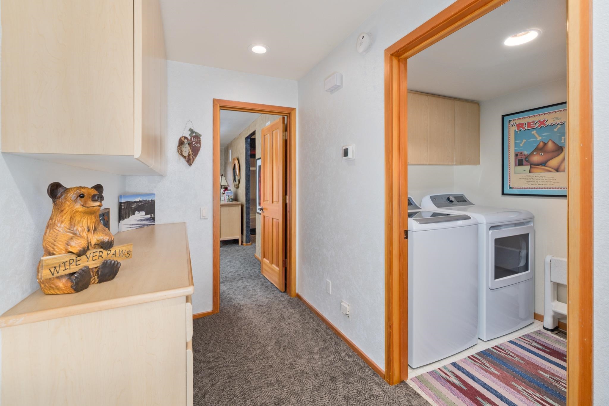 930 Links Way, Unit 930 Mammoth Lakes, CA 93546 - Photo 22 of 40 a view of a hallway with washer and dryer