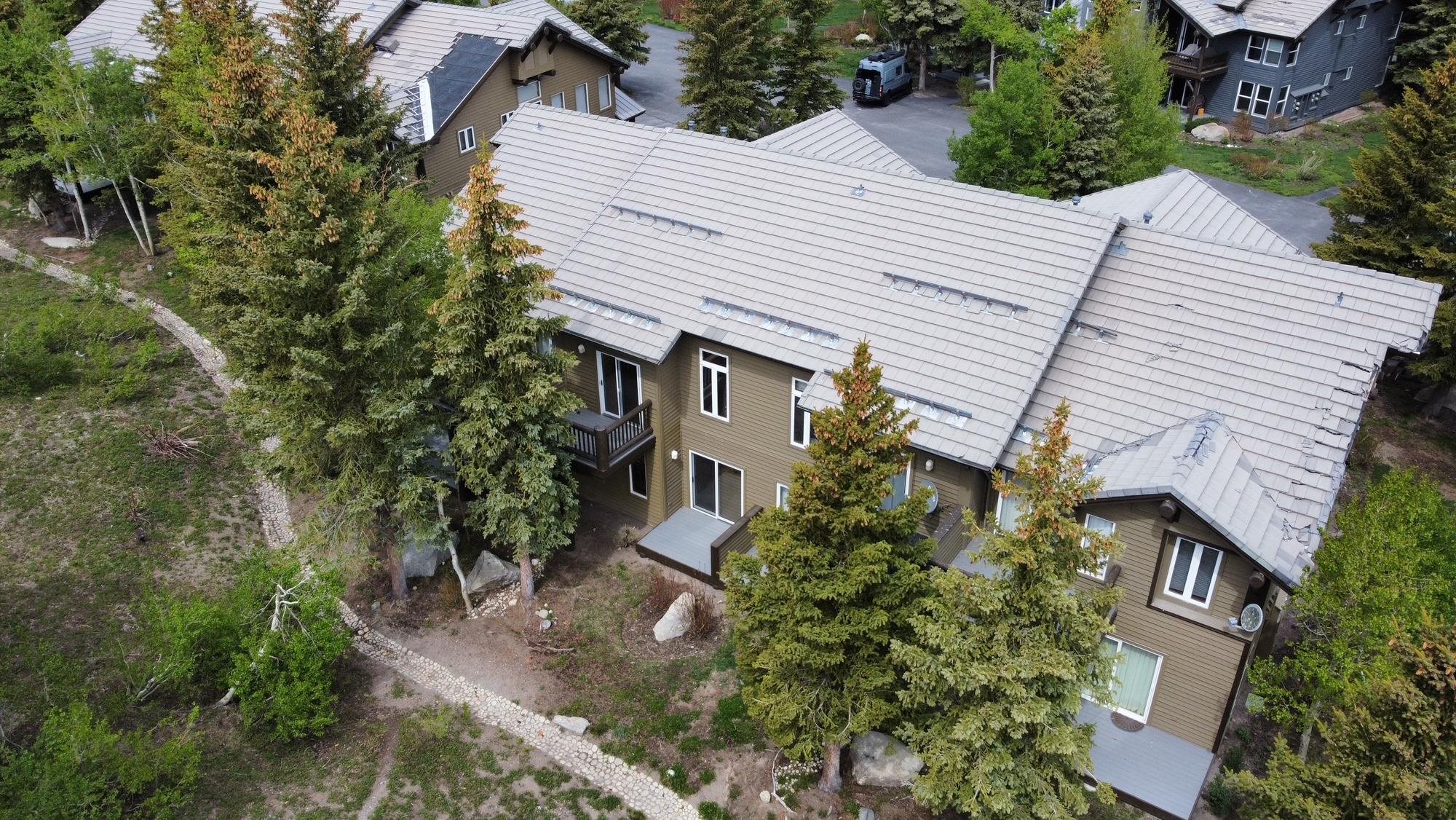 930 Links Way, Unit 930 Mammoth Lakes, CA 93546 - Photo 32 of 40 an aerial view of a house with a yard and potted plants