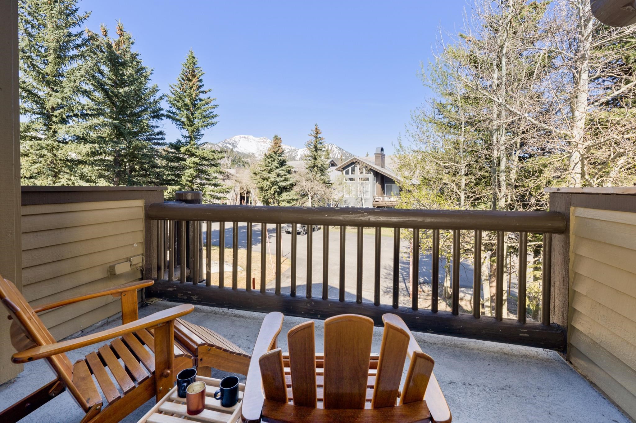 930 Links Way, Unit 930 Mammoth Lakes, CA 93546 - Photo 37 of 40 a view of a chairs and table in the balcony