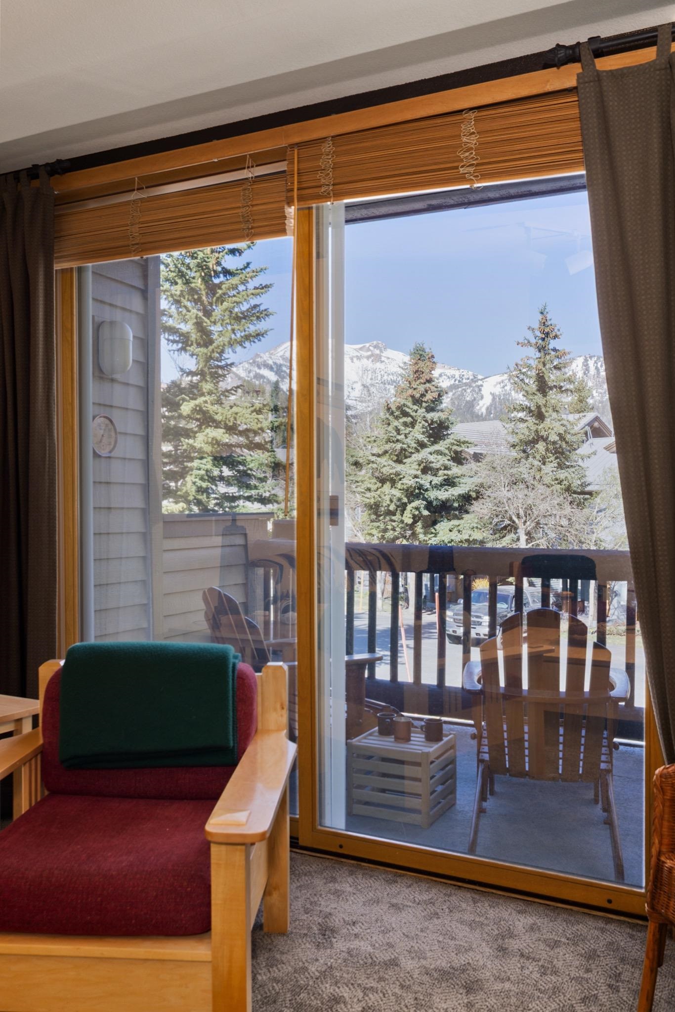 930 Links Way, Unit 930 Mammoth Lakes, CA 93546 - Photo 9 of 40 a view of a room with furniture and wooden floor