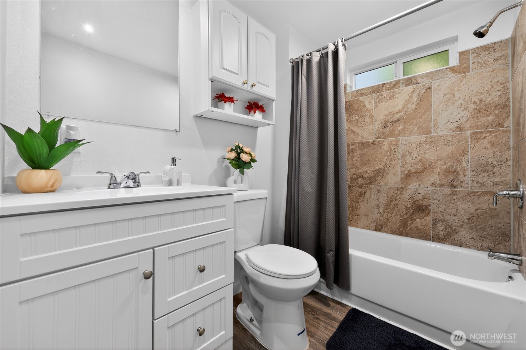 15503 Cedar Park Road Southeast, Unit 35C Olalla, WA 98359 - Photo 13 of 23 a bathroom with a sink a toilet and a bathtub