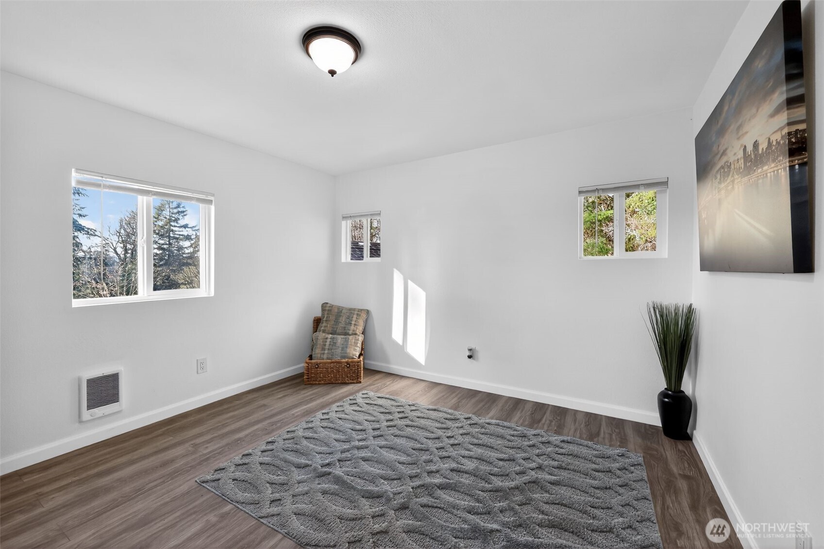 15503 Cedar Park Road Southeast, Unit 35C Olalla, WA 98359 - Photo 14 of 23 a view of an empty room with window and wooden floor