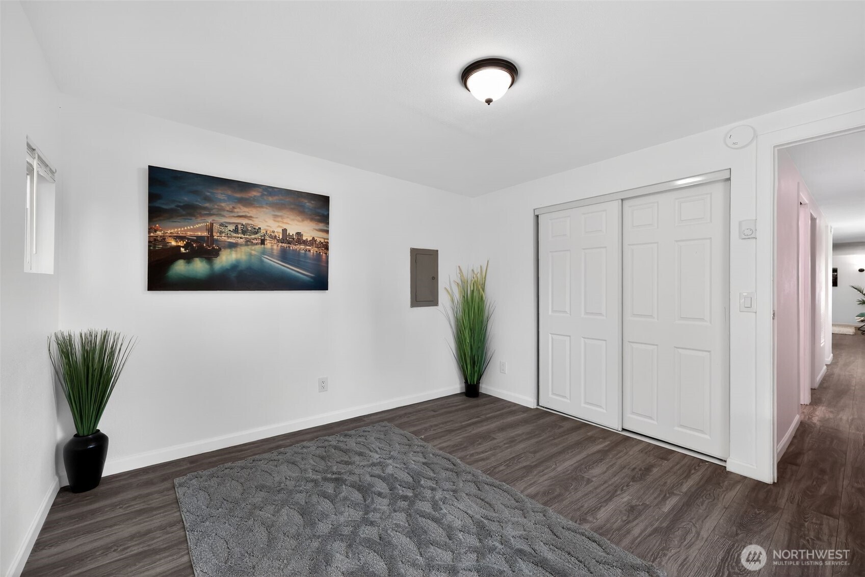 15503 Cedar Park Road Southeast, Unit 35C Olalla, WA 98359 - Photo 18 of 23 a view of empty room with wooden floor and fan