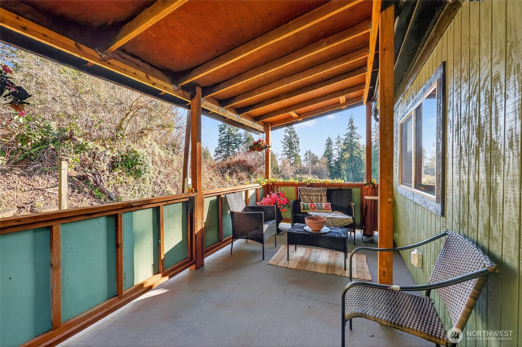 15503 Cedar Park Road Southeast, Unit 35C Olalla, WA 98359 - Photo 21 of 23 a view of an outdoor space with seating area