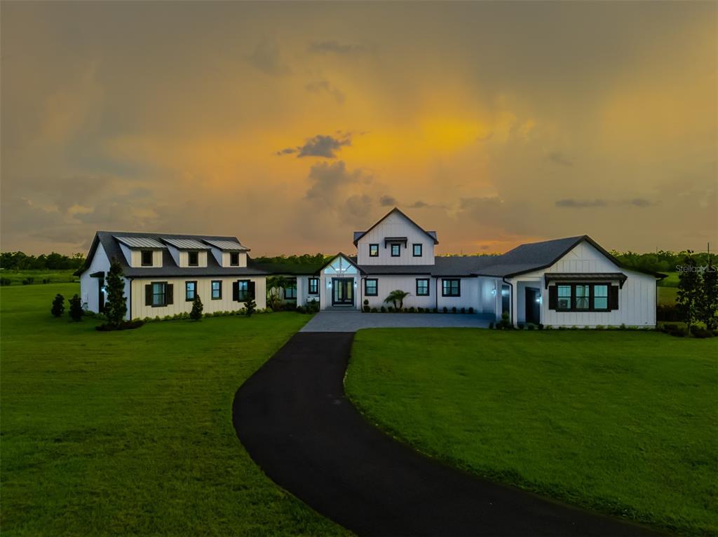 3515 Powerline Road Lithia, FL 33547 - Photo 1 of 1 a view of a house with garden