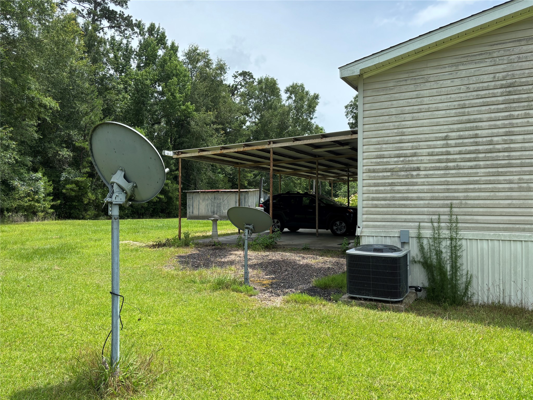 35599 State Highway South Buna, TX 77612 - Photo 11 of 40 a view of a chair and table in the backyard