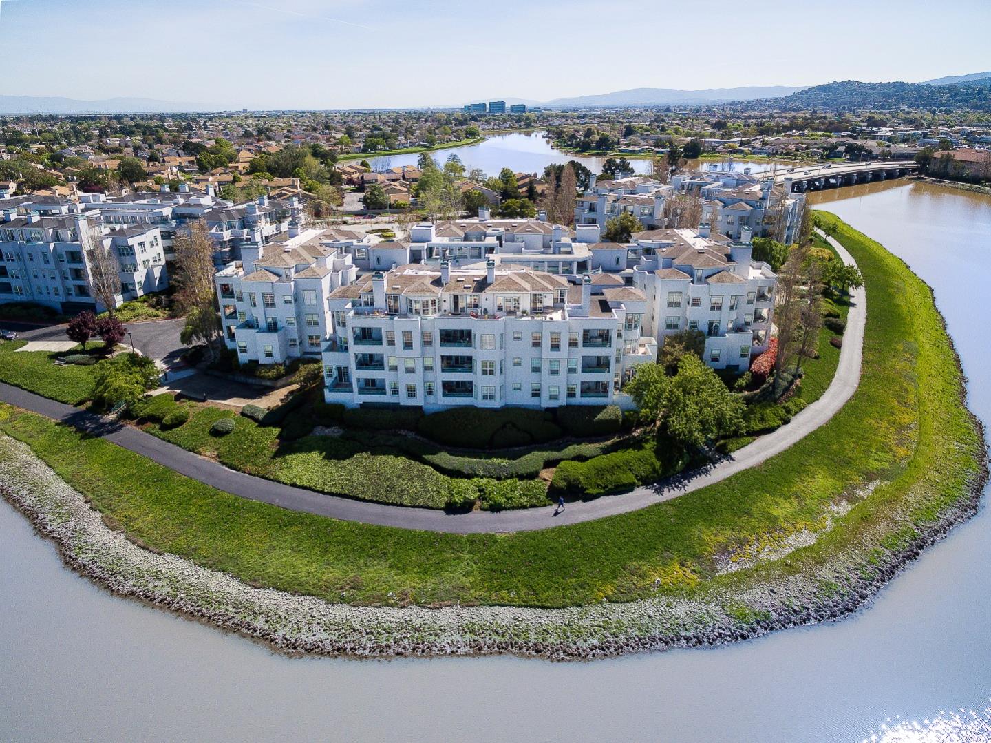 720 Promontory Point Lane, Unit 2402 Foster City, CA 94404 - Photo 1 of 24 a view of a swimming pool