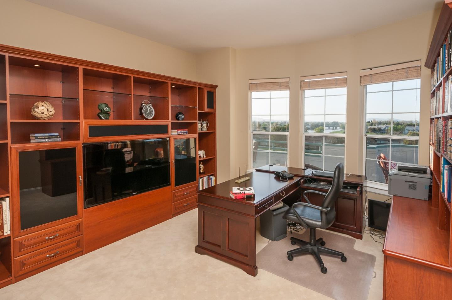 720 Promontory Point Lane, Unit 2402 Foster City, CA 94404 - Photo 15 of 24 a view of a workspace with furniture and a window