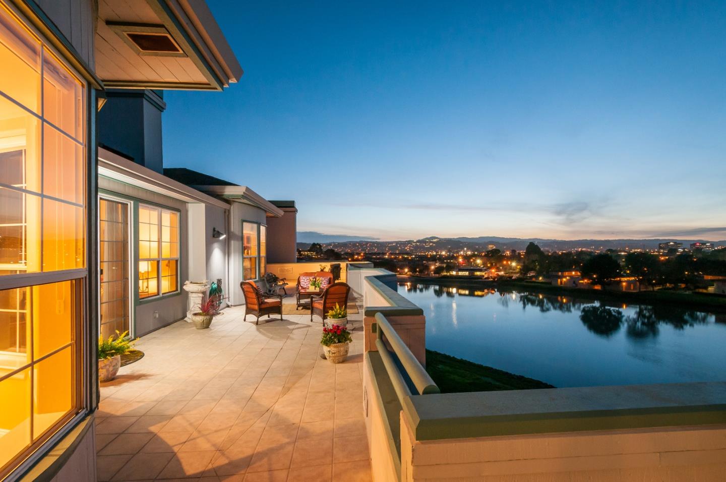 720 Promontory Point Lane, Unit 2402 Foster City, CA 94404 - Photo 19 of 24 a balcony with chairs and a table
