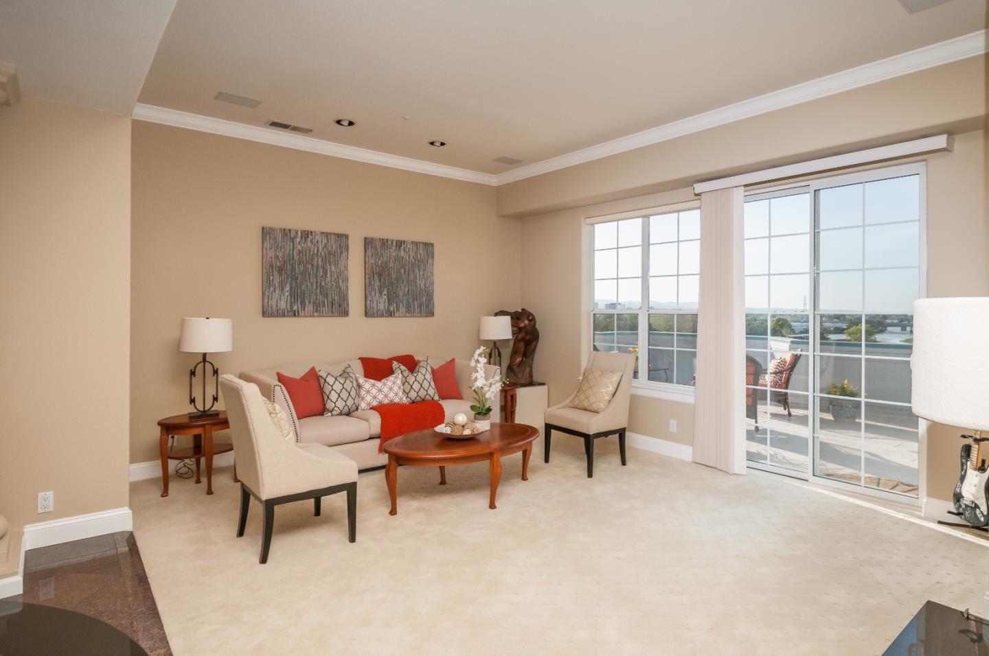 720 Promontory Point Lane, Unit 2402 Foster City, CA 94404 - Photo 6 of 24 a living room with furniture and a large window