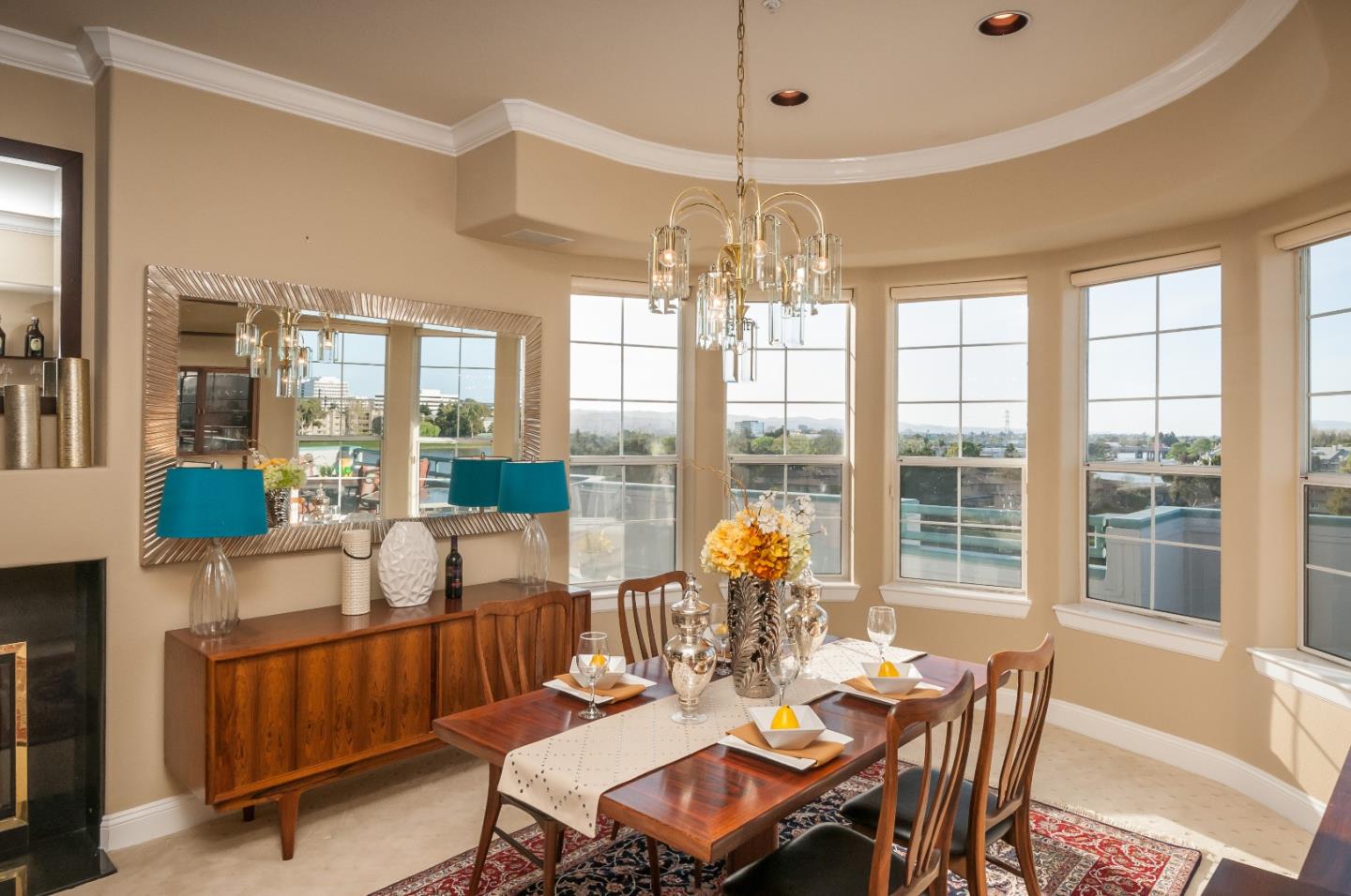 720 Promontory Point Lane, Unit 2402 Foster City, CA 94404 - Photo 7 of 24 a view of a dining room with furniture large windows and wooden floor