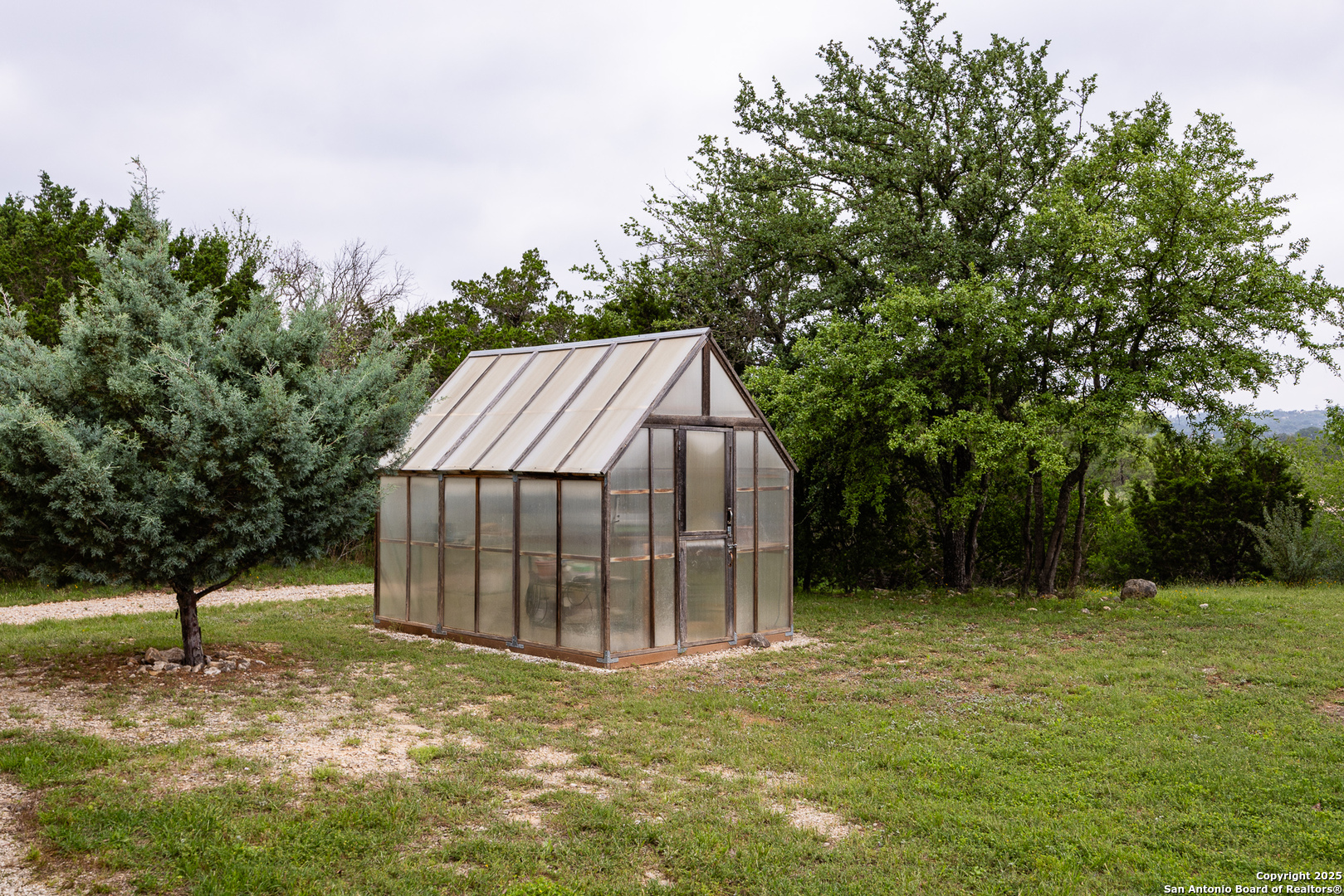 1897 Kyle Ranch Road Bandera, TX 78003 - Photo 16 of 48 a view of backyard with green space