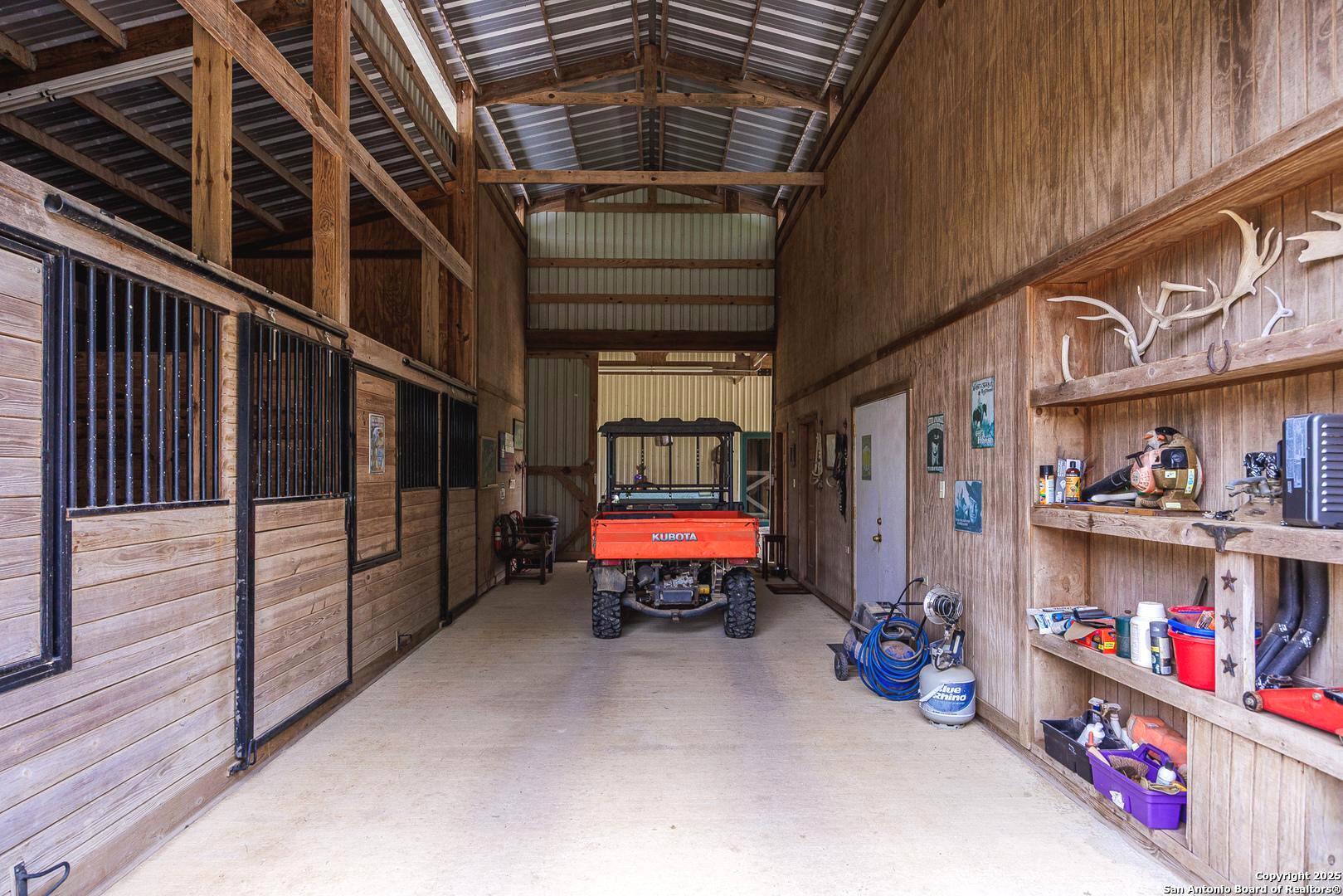 1897 Kyle Ranch Road Bandera, TX 78003 - Photo 21 of 48 a utility room with fridge