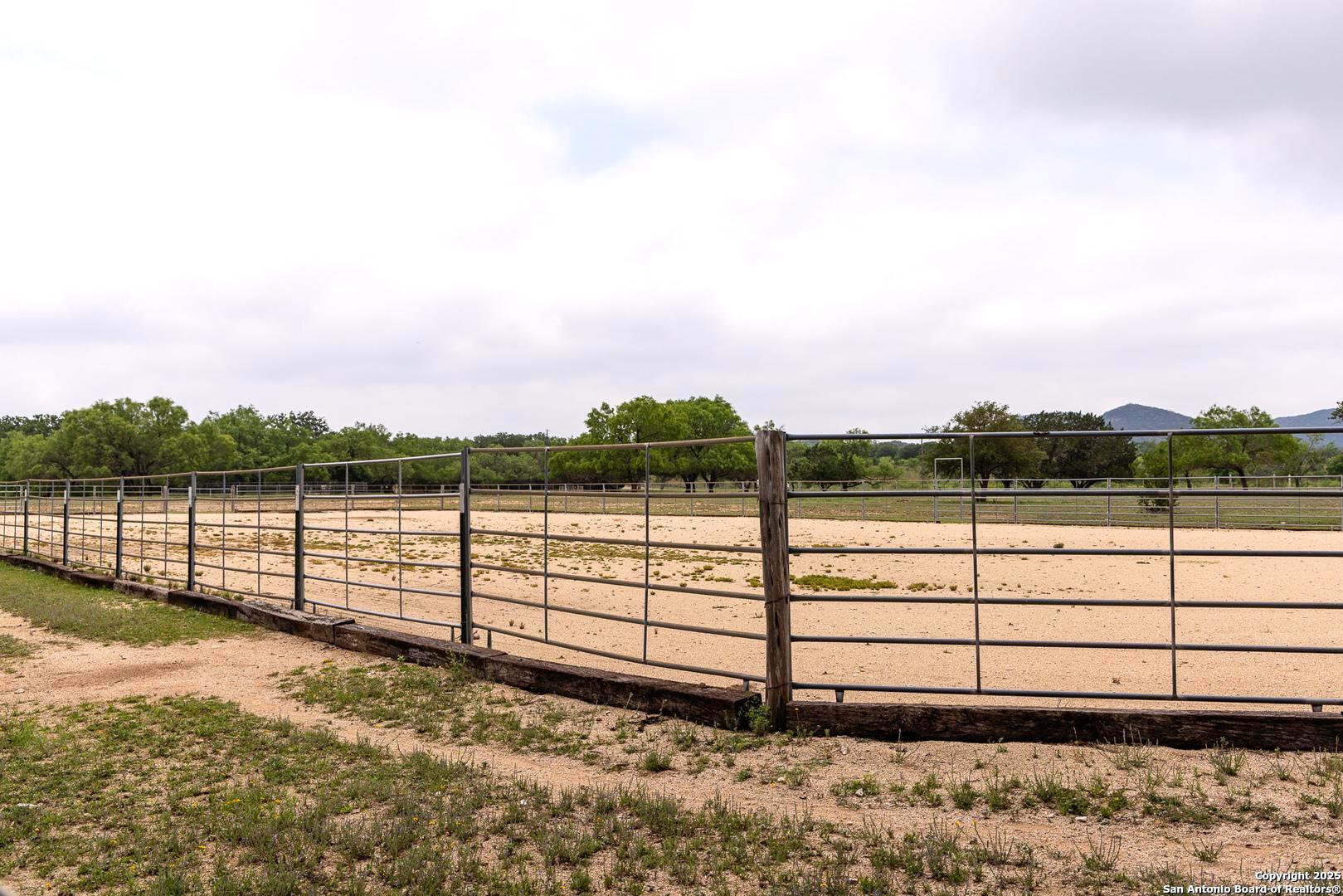 1897 Kyle Ranch Road Bandera, TX 78003 - Photo 34 of 48 a view of a yard with wooden fence