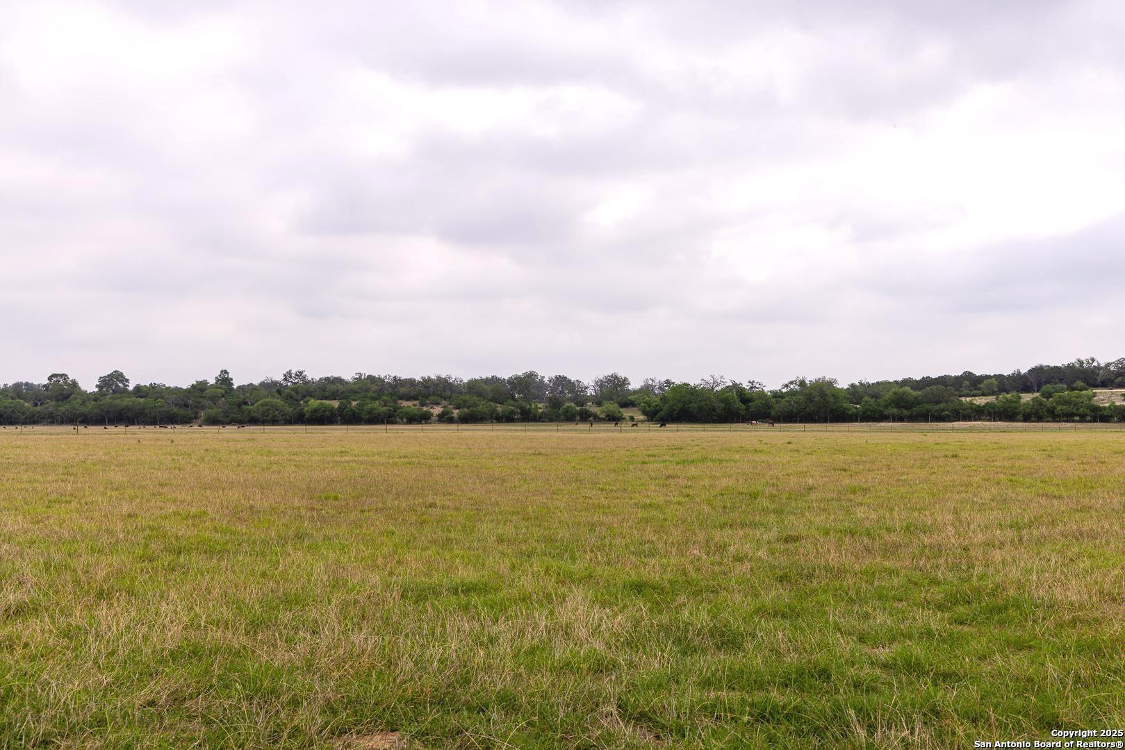 1897 Kyle Ranch Road Bandera, TX 78003 - Photo 43 of 48 a view of a lake and mountain view