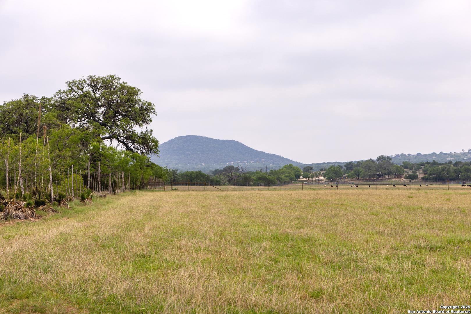 1897 Kyle Ranch Road Bandera, TX 78003 - Photo 46 of 48 a view of lake and mountain