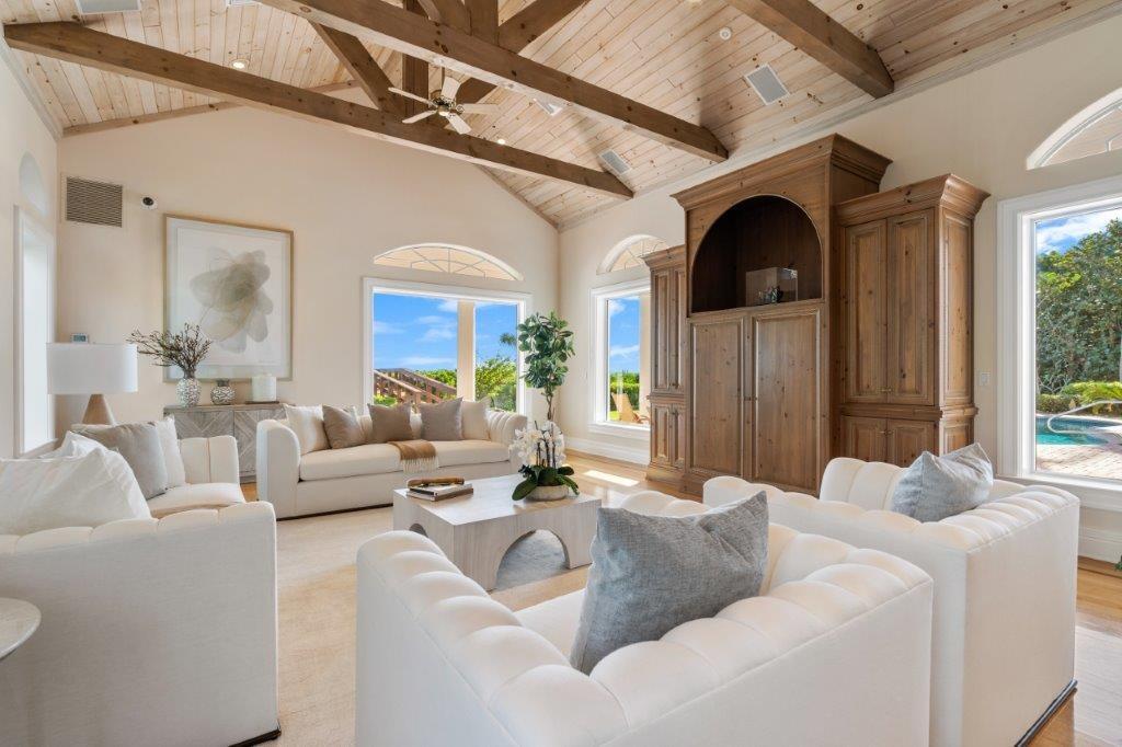 181 Ocean Beach Trail Vero Beach, FL 32963 - Photo 12 of 35 a living room with furniture and a large window